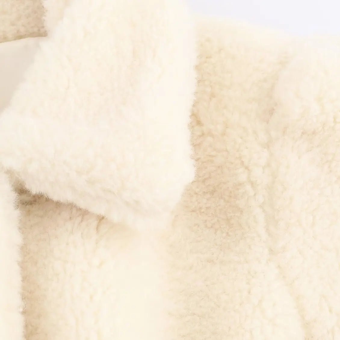 Cappotto in finta pelliccia con cintura Aellinne
