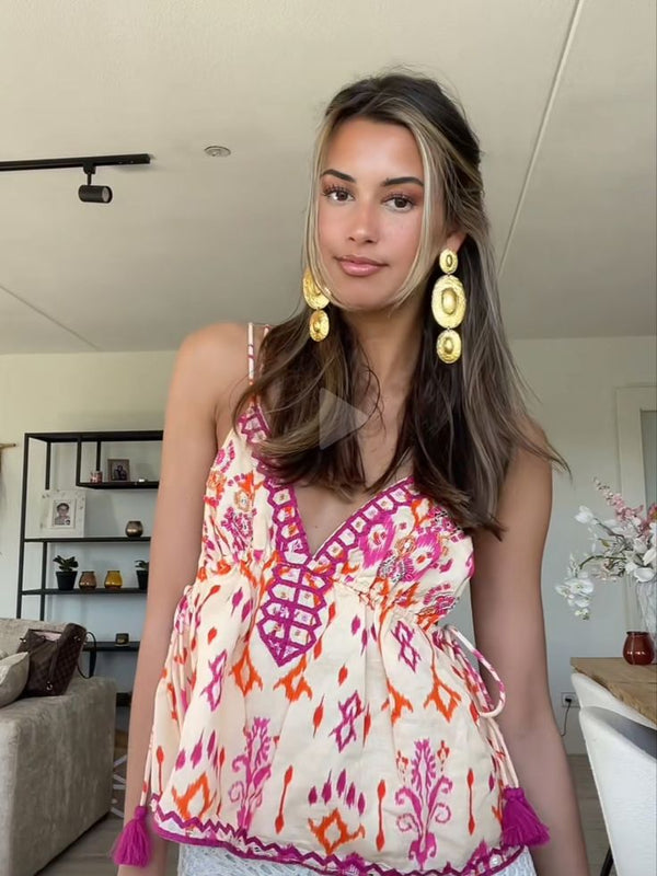 Top Agrafena con lacci, nappe e ricami in stile boho