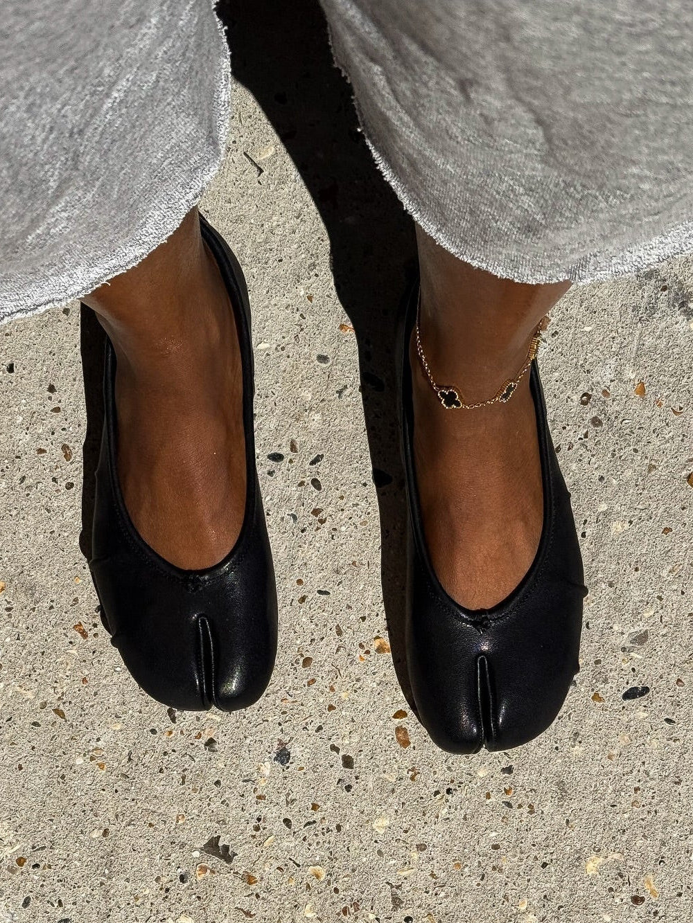 Mules in pelle con punta divisa Bianca