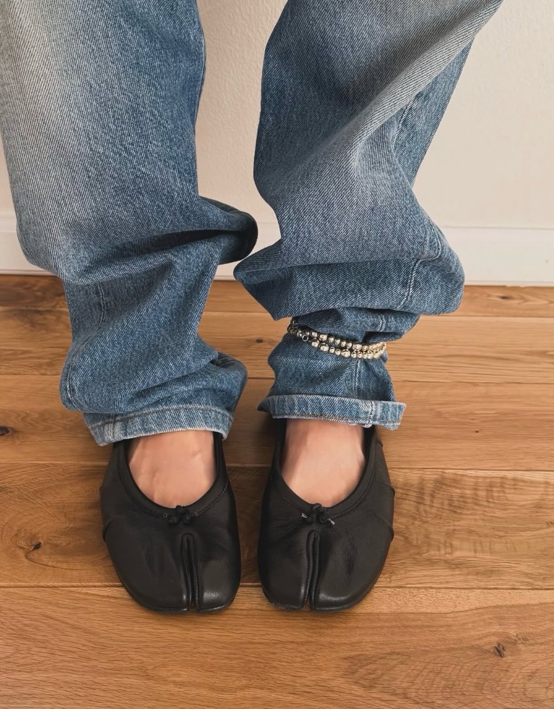 Mules in pelle con punta divisa Bianca