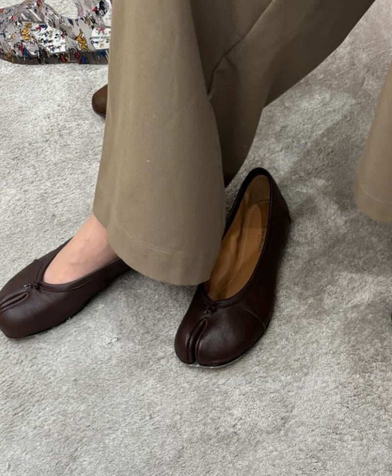 Mules in pelle con punta divisa Bianca