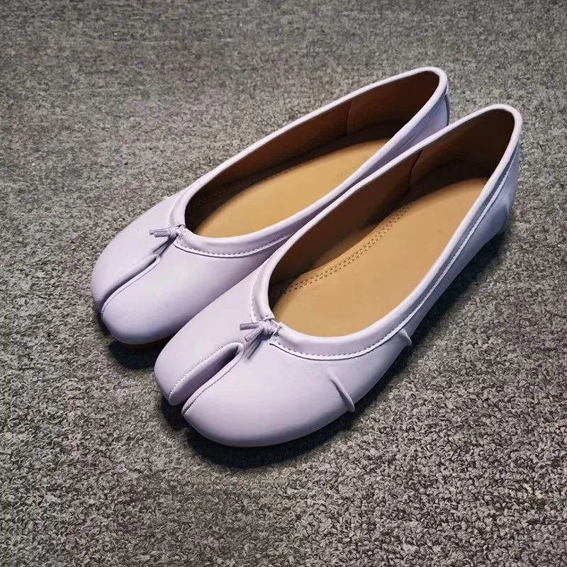 Mules in pelle con punta divisa Bianca