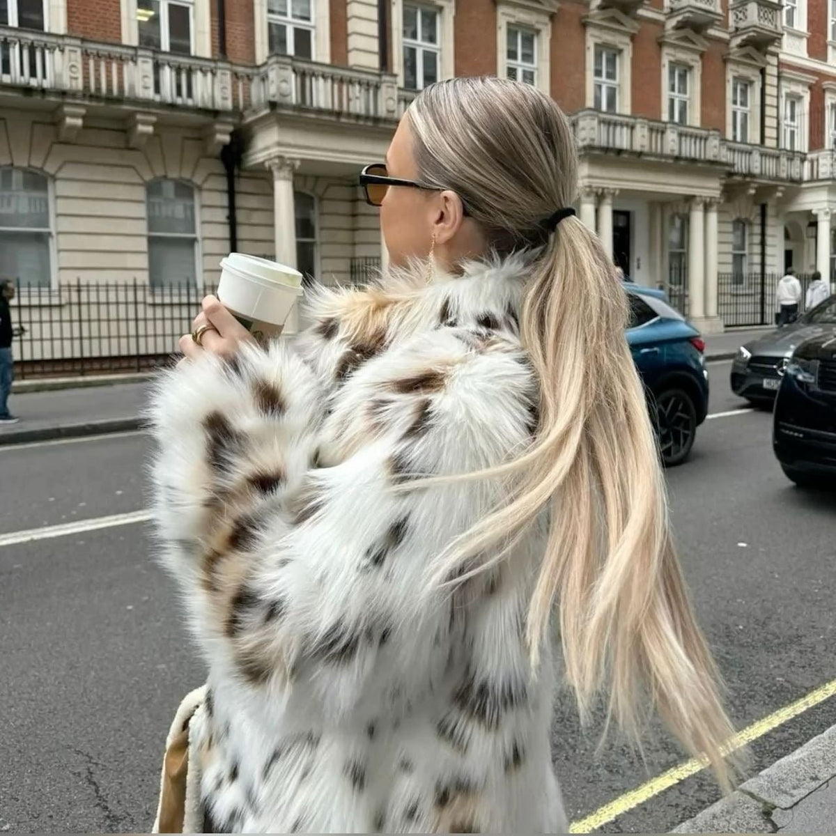 Cappotto in pelliccia sintetica leopardata Celeste
