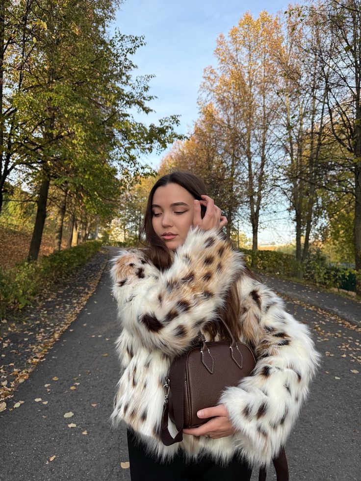 Cappotto in pelliccia sintetica leopardata Celeste