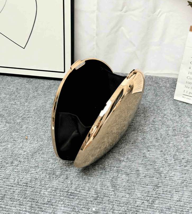 Clutch da sera a forma di conchiglia Celeste