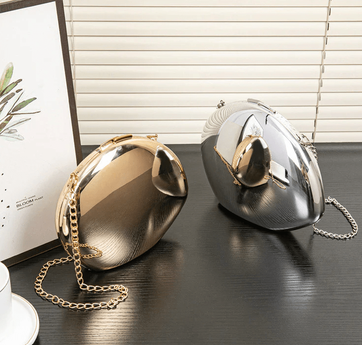 Clutch da sera a forma di conchiglia Celeste