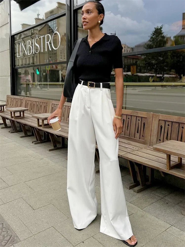 Pantaloni Celia a vita alta e gamba larga