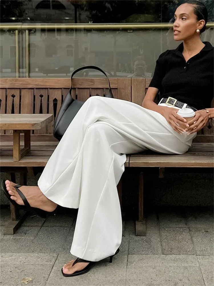 Pantaloni Celia a vita alta e gamba larga