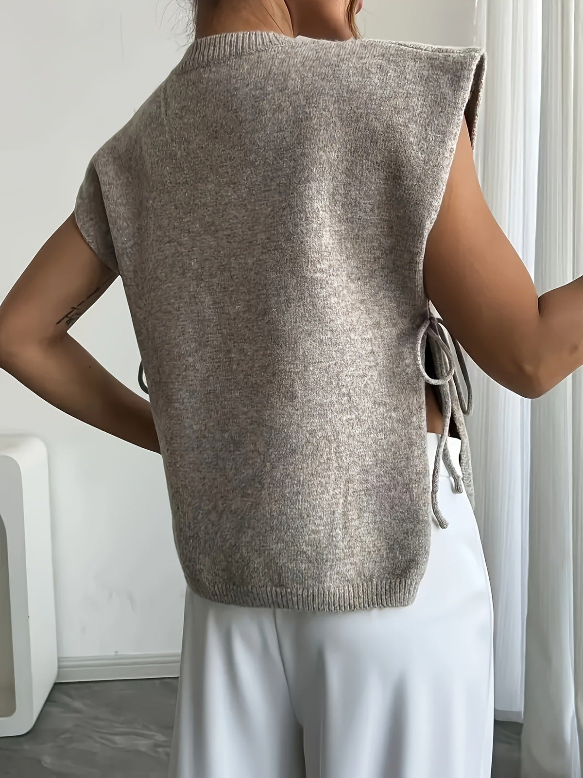 Top in maglia Clara con nodo laterale