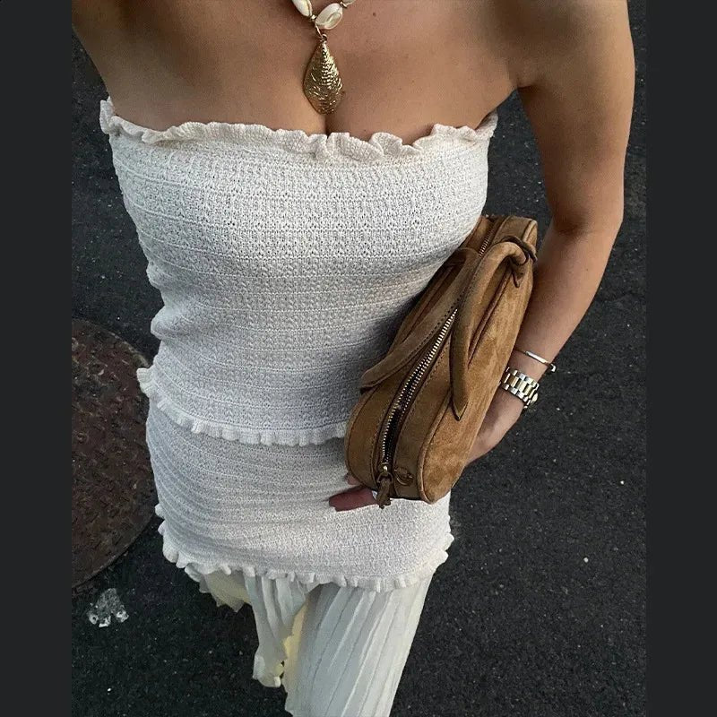 Completo Claudia con canottiera in maglia e gonna plissettata