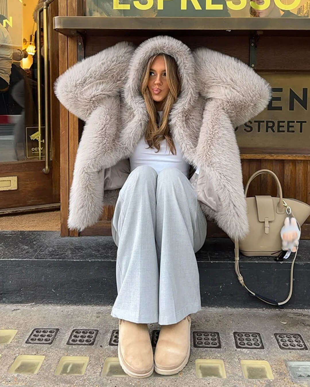 Giacca con cappuccio in ecopelliccia Dana