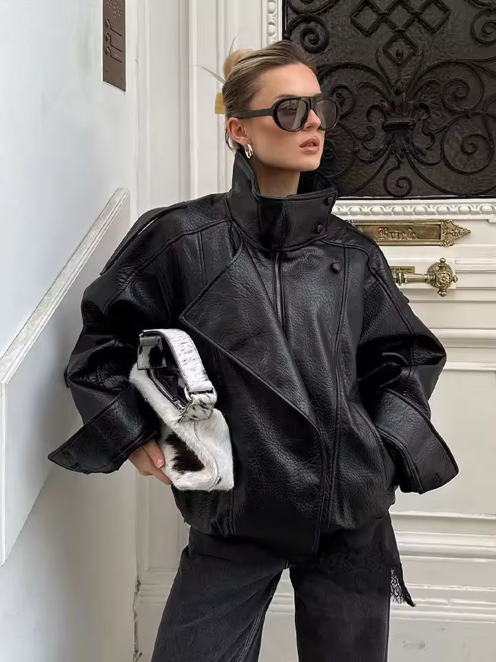 Giacca asimmetrica con bottoni e tasche Elena