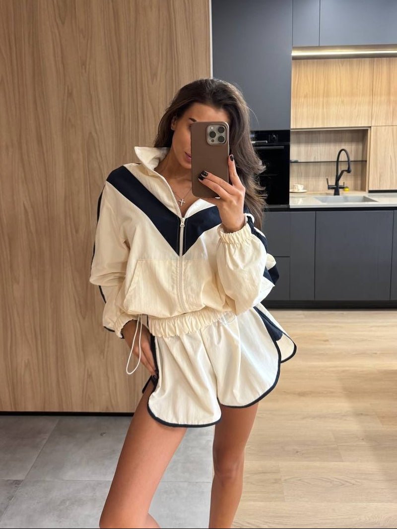Completo Ellen antivento con motivo chevron e pantaloncini