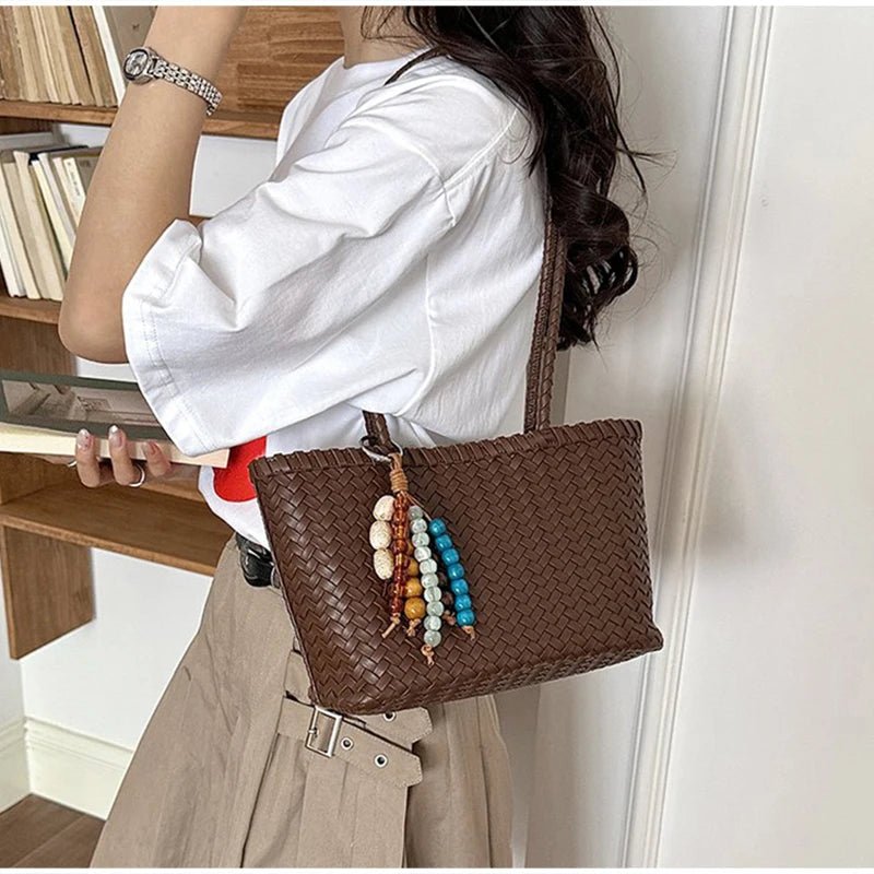 Borsa tote intrecciata in paglia Emma