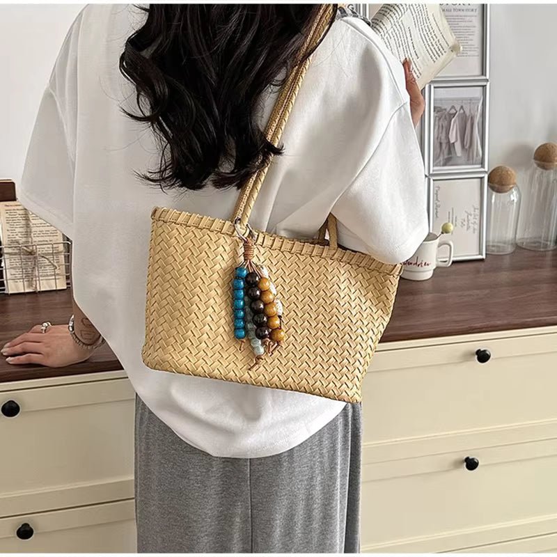 Borsa tote intrecciata in paglia Emma