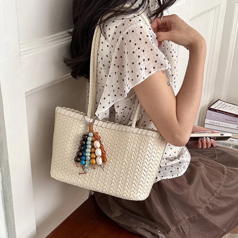 Borsa tote intrecciata in paglia Emma