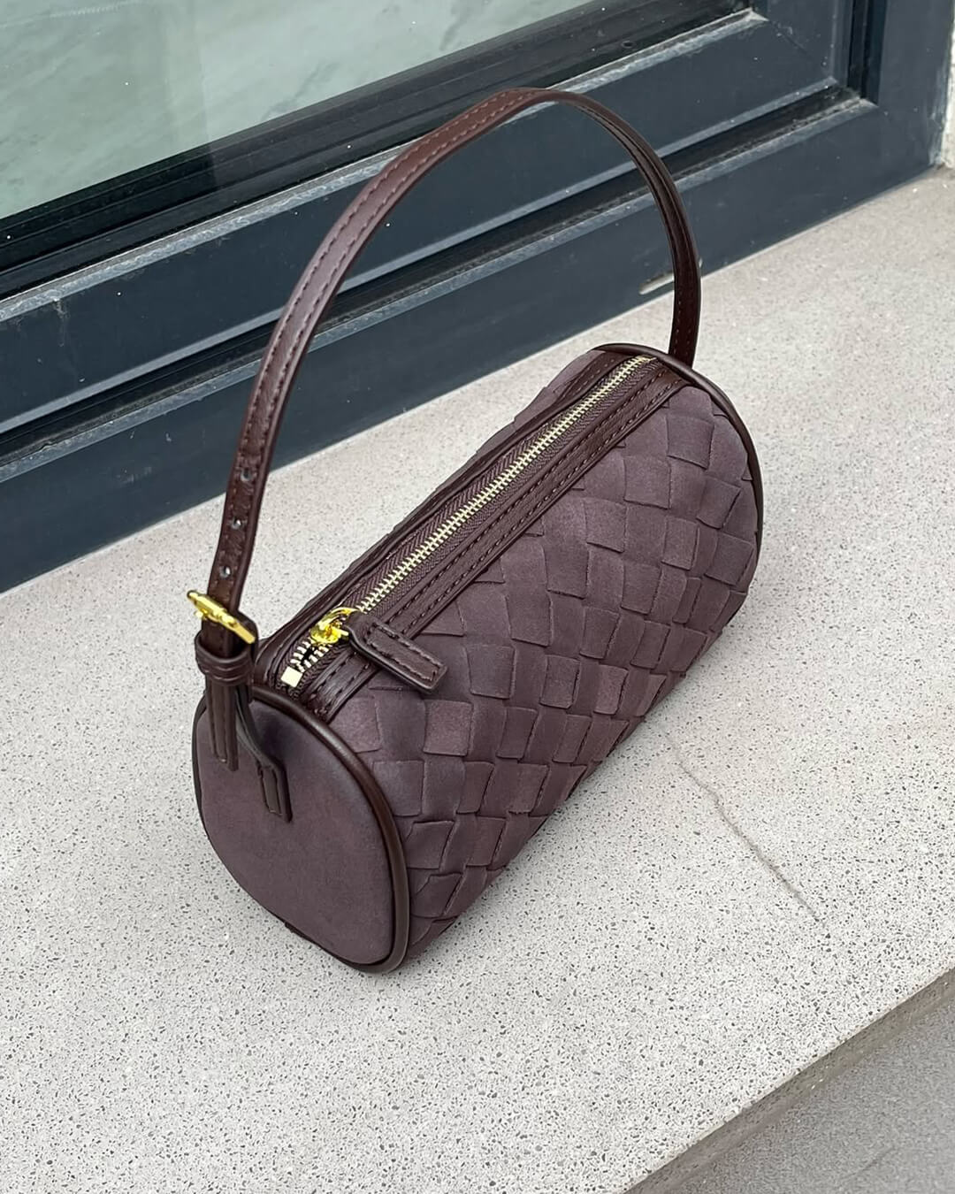 Borsa intrecciata in pelle scamosciata Eva