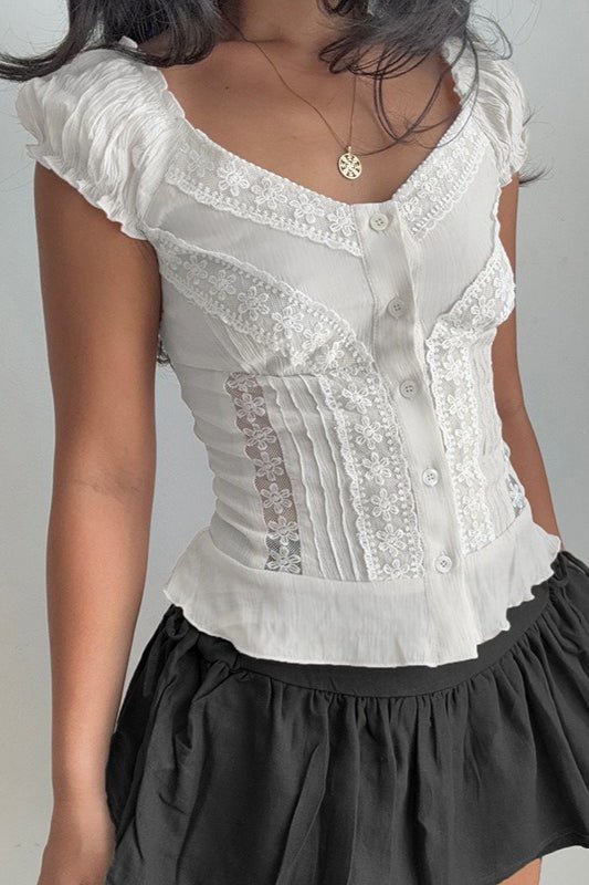 Camicia in pizzo Hannah con bottoni sul davanti e maniche a sbuffo