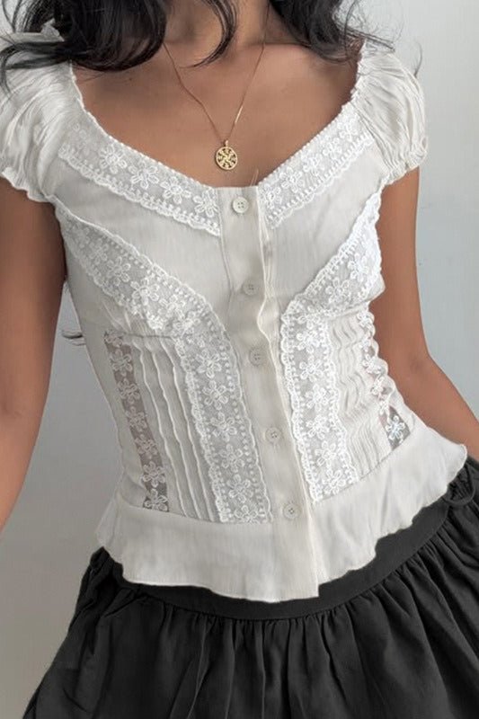 Camicia in pizzo Hannah con bottoni sul davanti e maniche a sbuffo