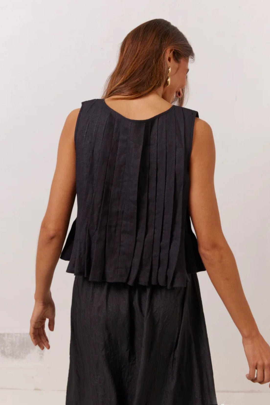 Top Honora con orlo a balze e allacciatura frontale