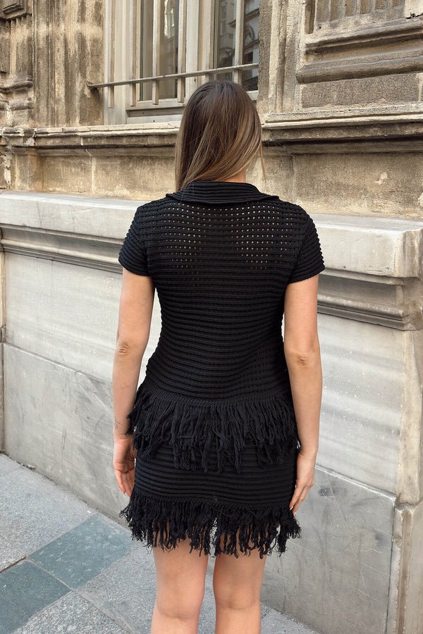 Completo in maglia con gonna e nappine Ioanna