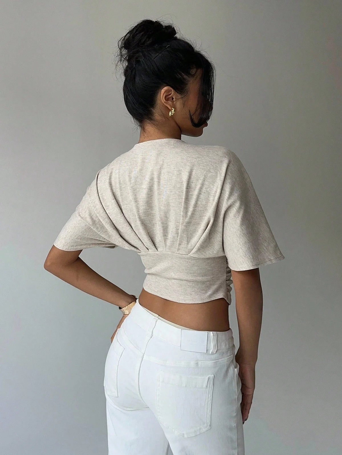 Blusa aderente con scollo profondo Kendra