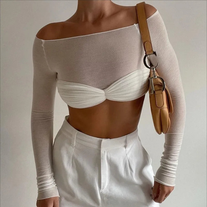Top in maglia con spalle scoperte