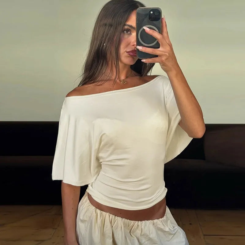 Top in pizzo con schiena scoperta e allacciatura