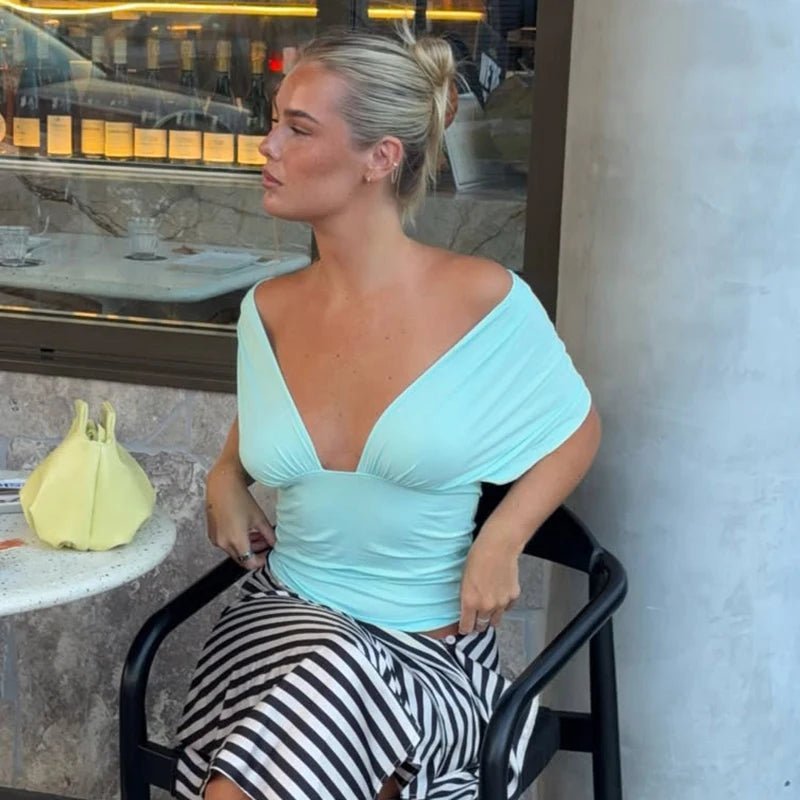 Top corto in pizzo con lacci Leonor