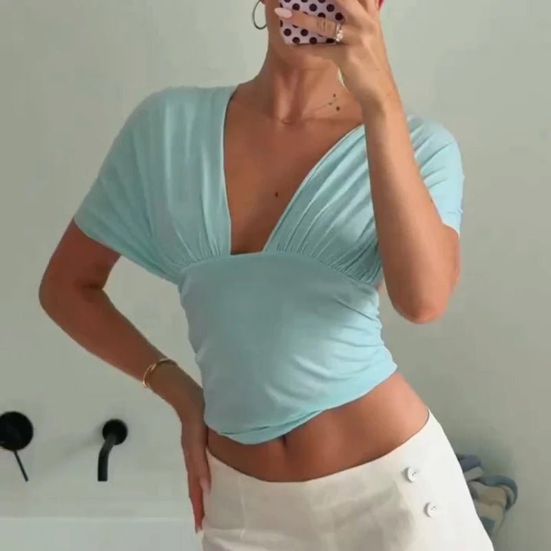 Top corto in pizzo con lacci Leonor