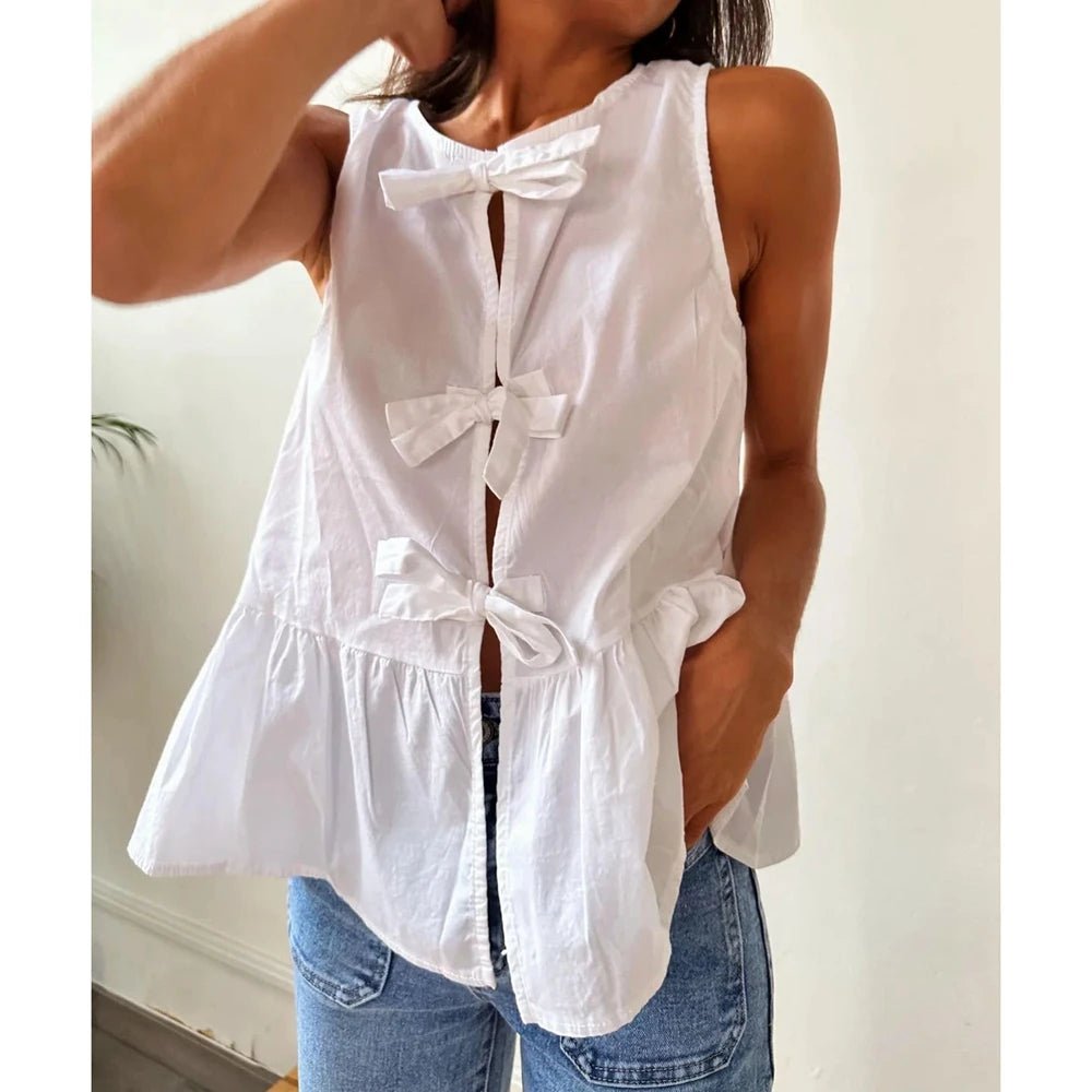 Top smanicato peplum Lisette con fiocco
