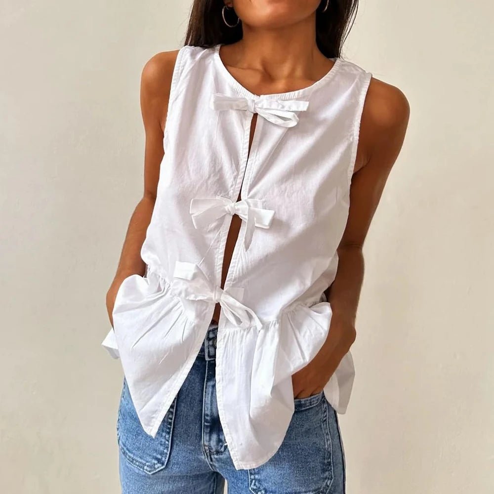 Top smanicato peplum Lisette con fiocco