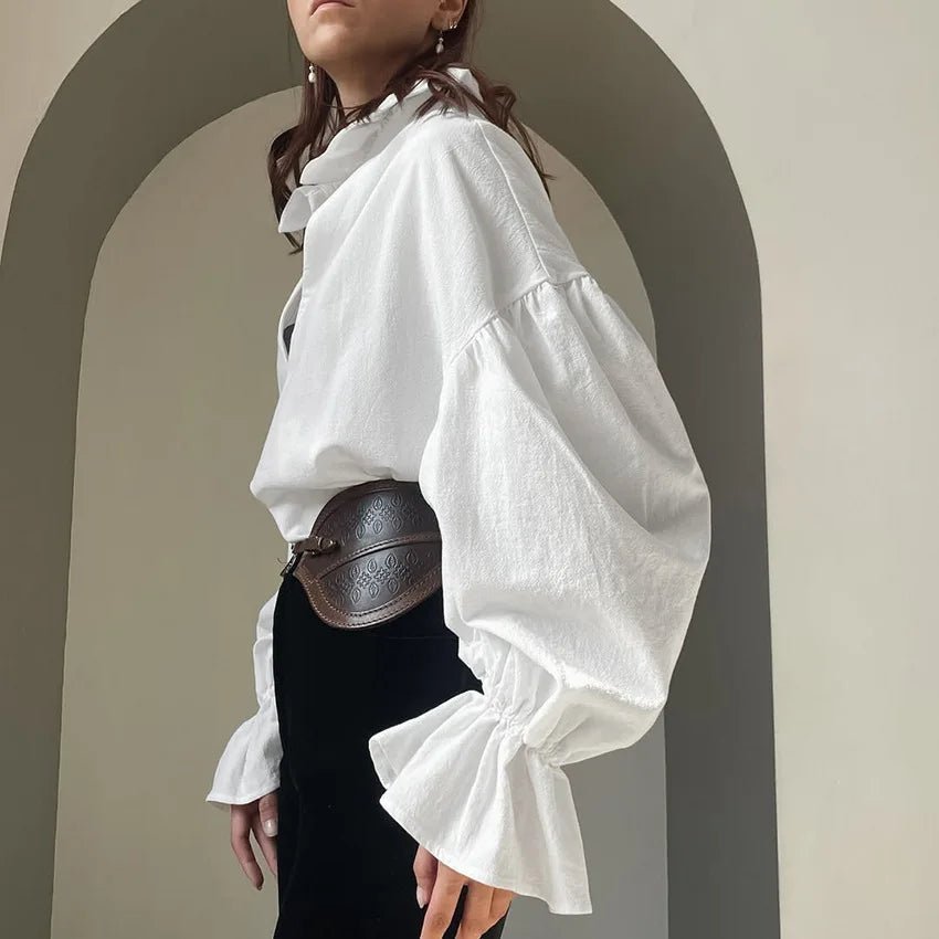 Blusa Lola a maniche lunghe a sbuffo con scollo a V