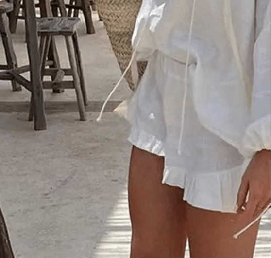 Set Luna con top a maniche lunghe e shorts con volant