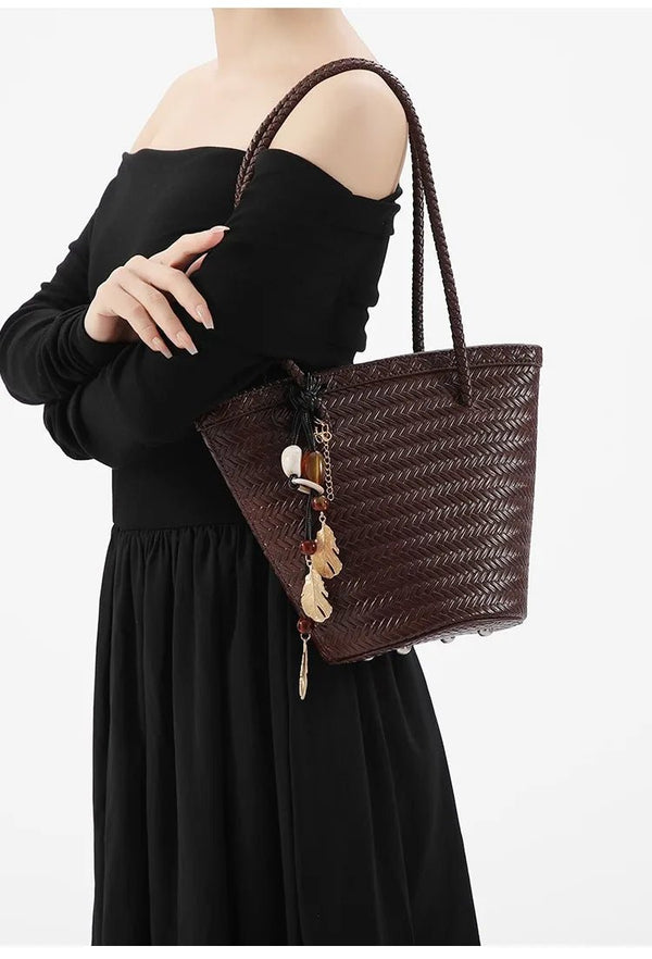 Borsa a secchiello intrecciata Meryl con pochette