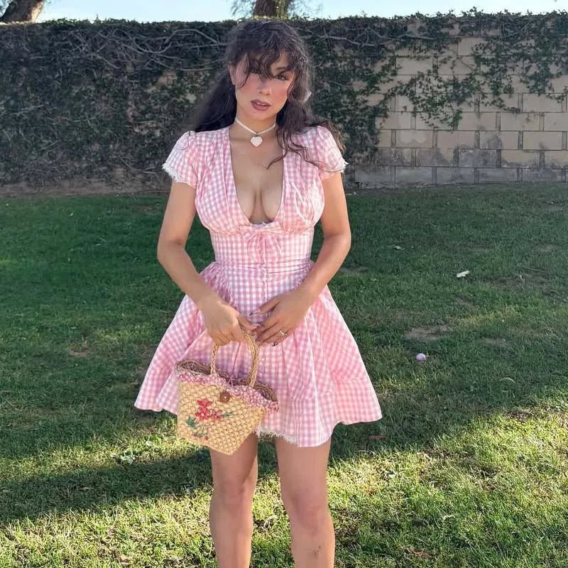 Miniabito con fiocco e scollo a V Mia