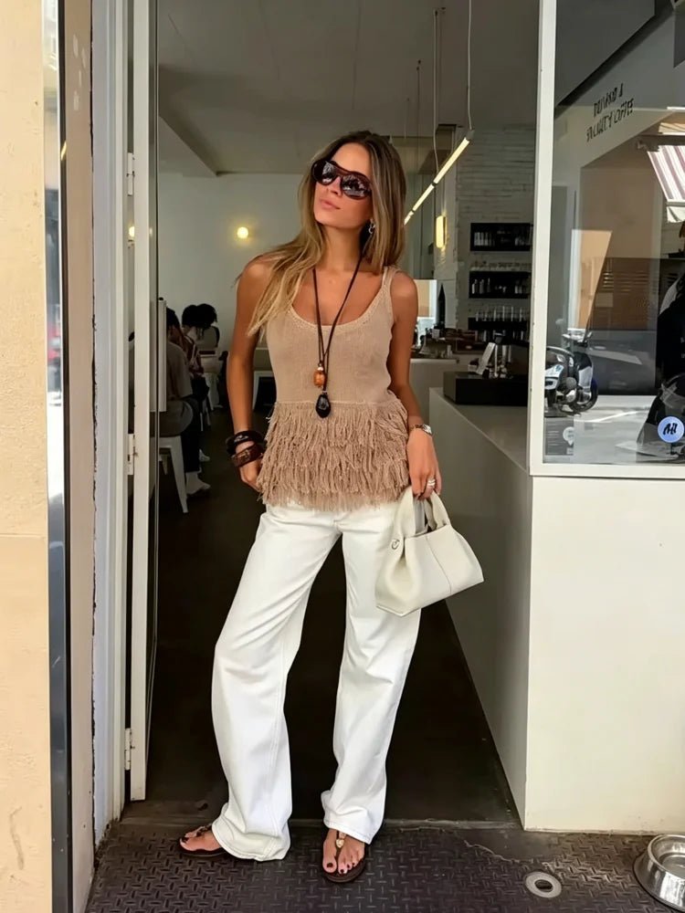 Top a canotta in maglia con nappe Mia