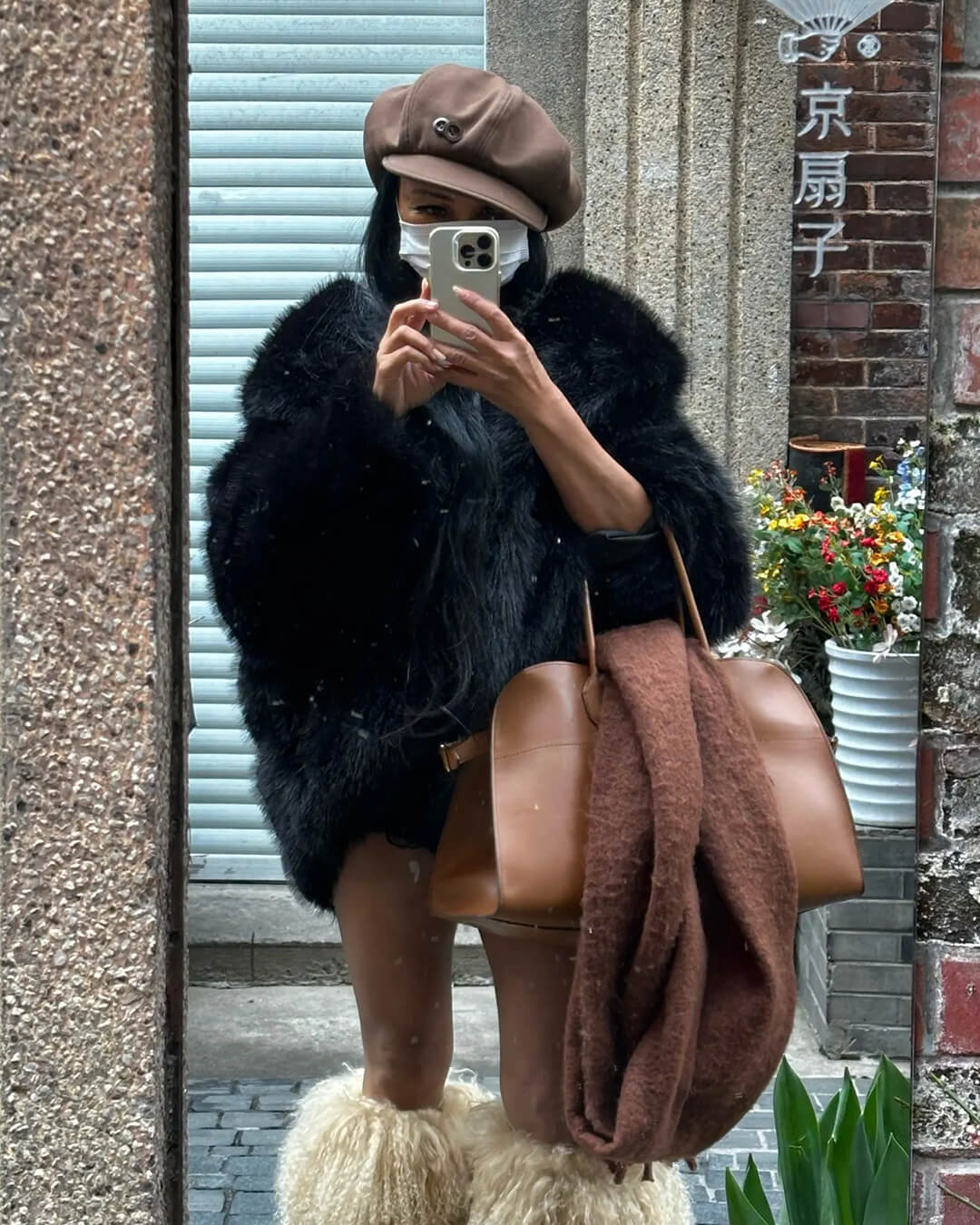 Cappotto con cappuccio in pelliccia sintetica Nicki