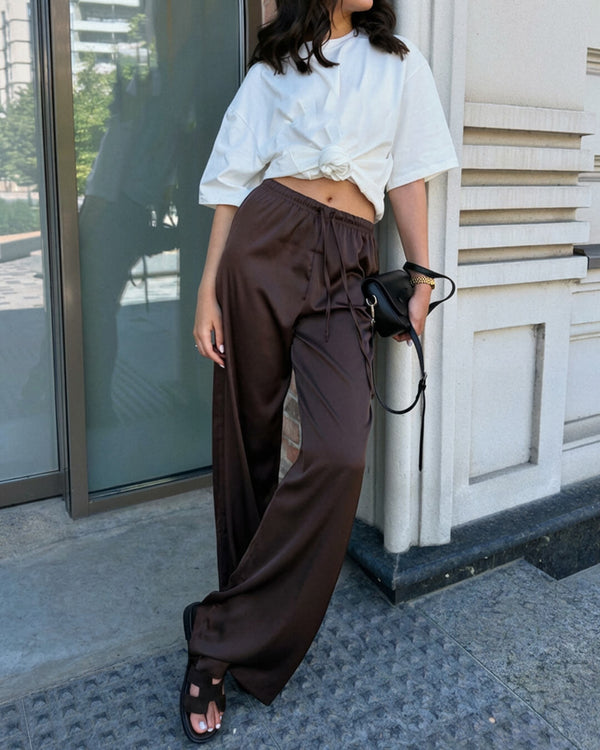 Pantaloni Norma in raso a vita alta e gamba larga