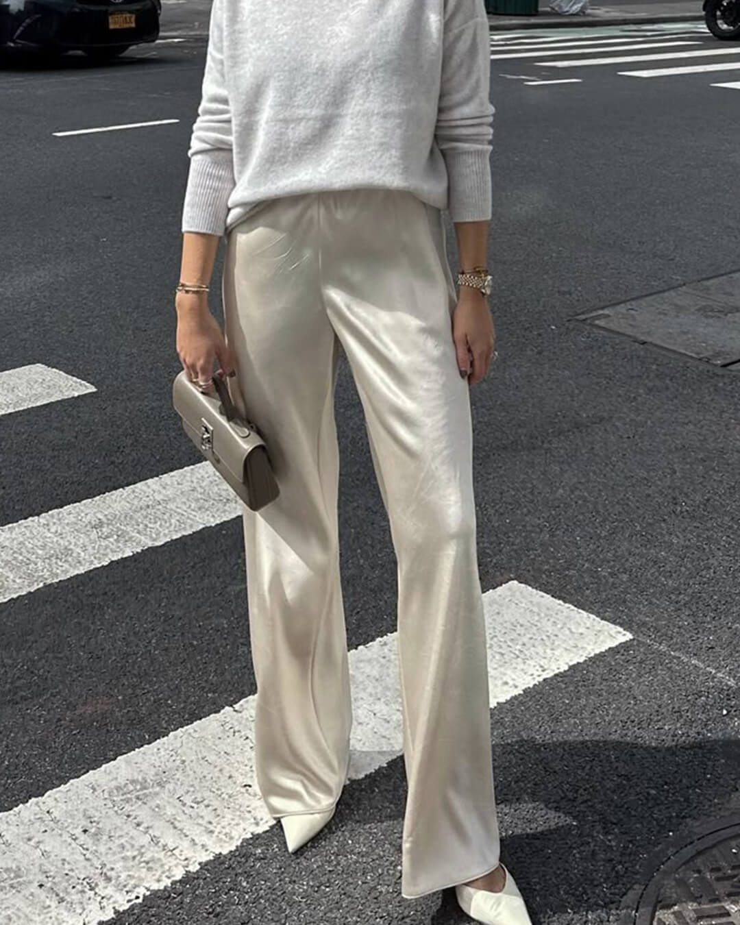 Pantaloni Norma in raso a vita alta e gamba larga