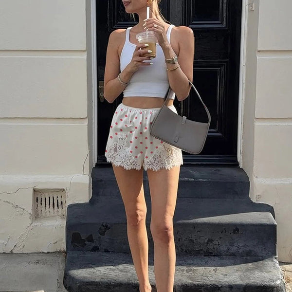 Shorts a pois con bordo in pizzo Pauleen