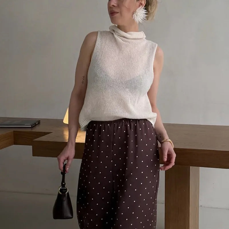Maglione oversize trasparente con cut-out