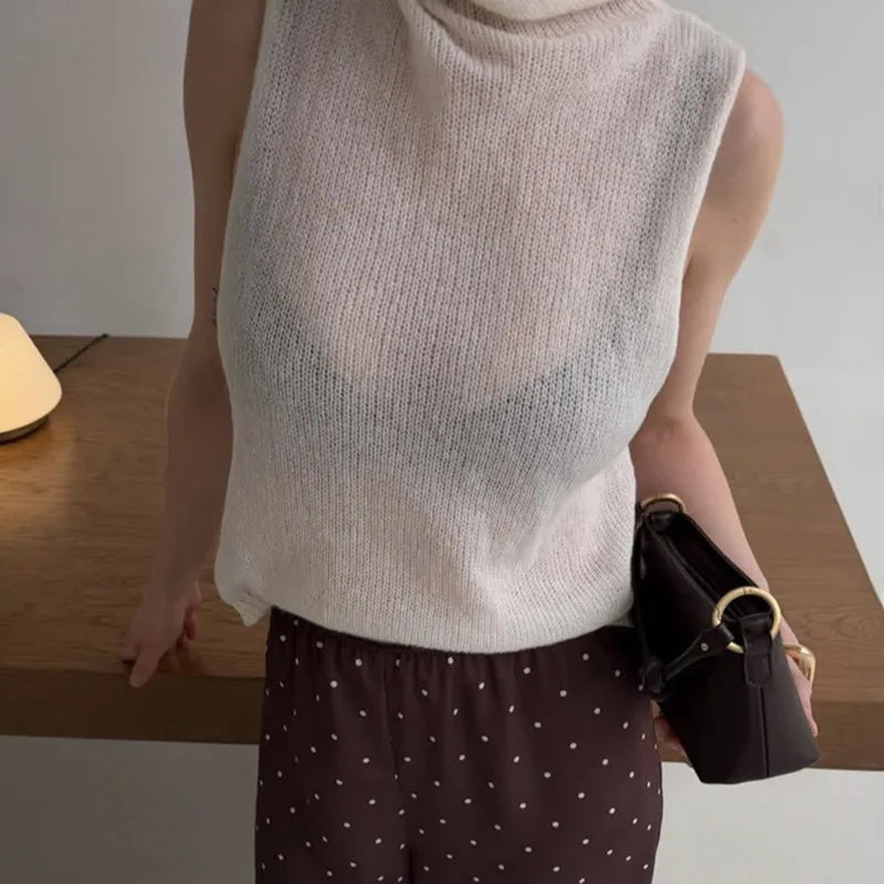 Maglione oversize trasparente con cut-out
