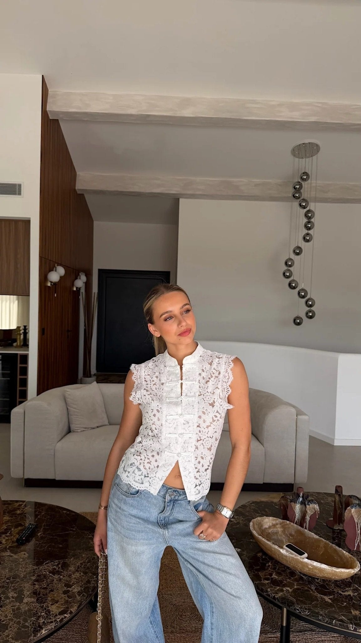 Top Sonia senza maniche in pizzo con collo alla coreana