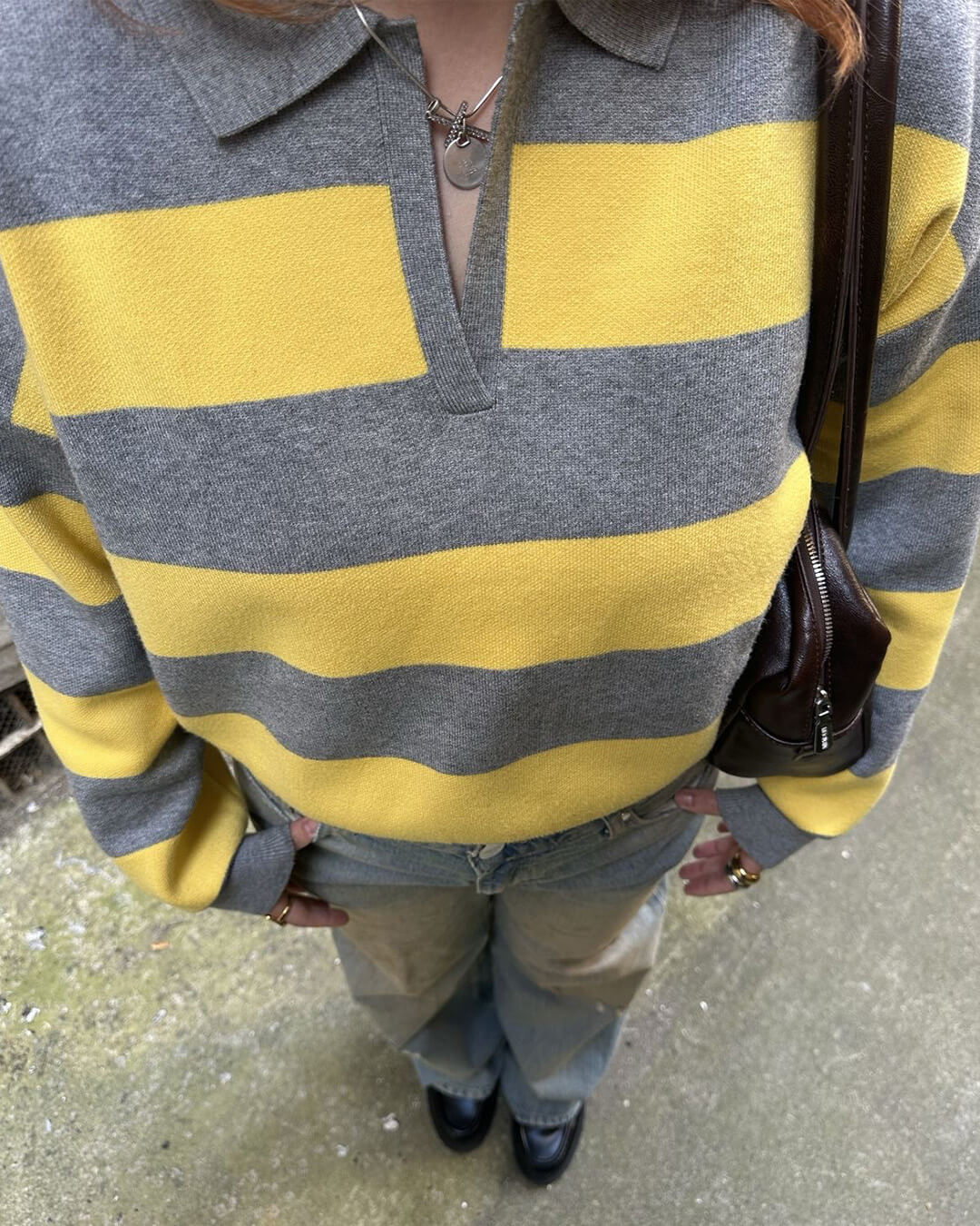Pullover in maglia a righe con scollo a V Una