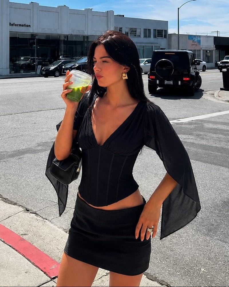 Top corsetto in chiffon con maniche a campana Valerie
